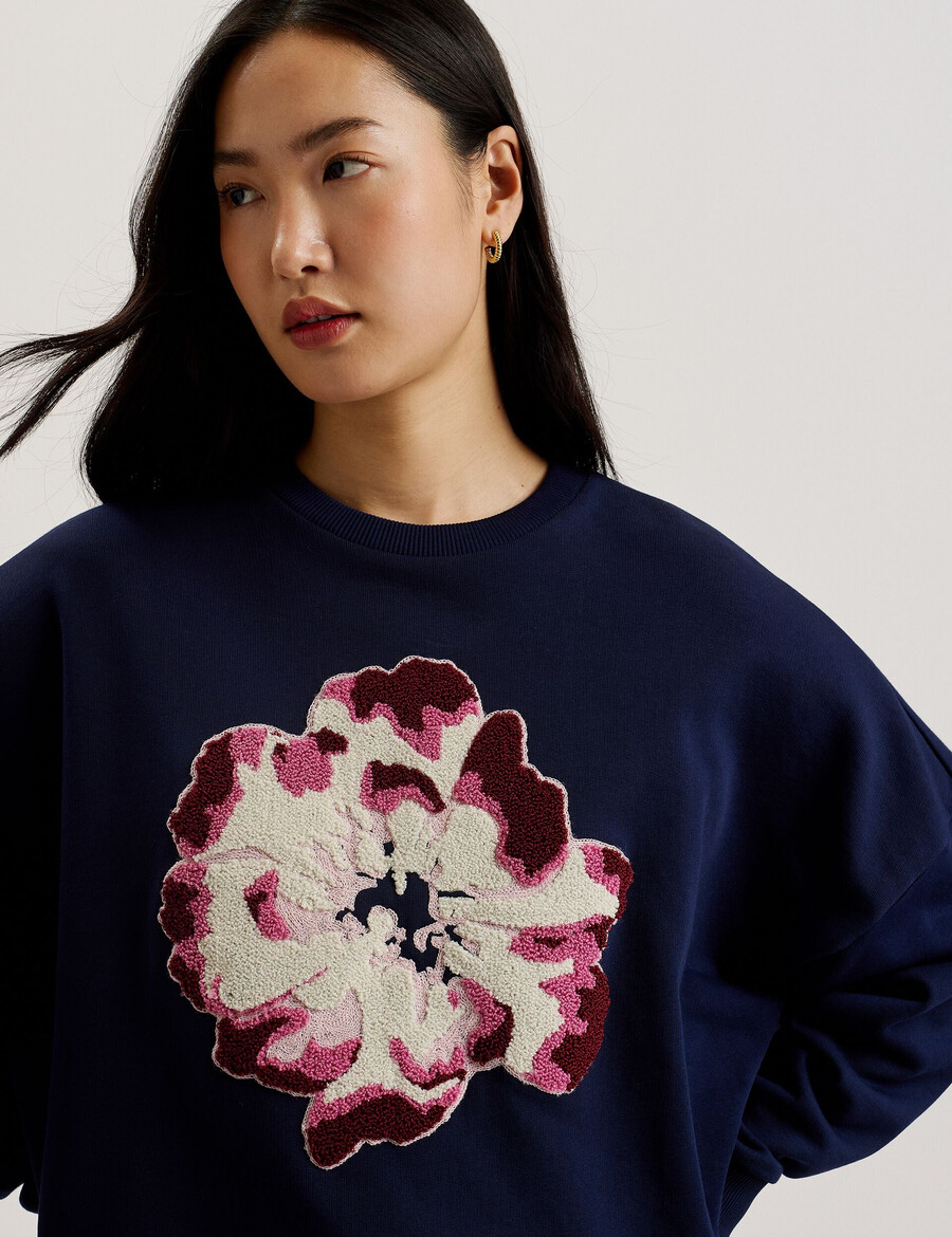 raynahh - moletom de algodão com estampa floral texturizada