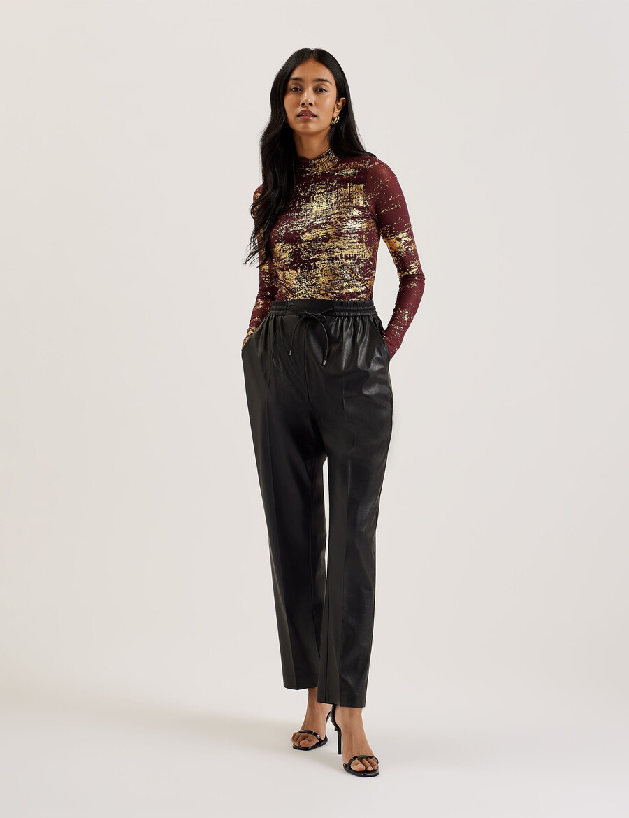 sofiy - blusa de malha com gola alta e estampa metalizada